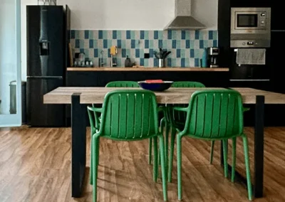 shared kitchen at gay men-only guesthouse near Sitges and relaxed atmosphere