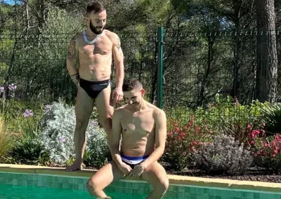 clothing-optional pool with sea and mountain views at gay men-only guesthouse near Sitges and Barcelona
