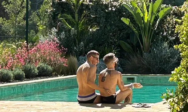 gay men-only clothing optional pool surrounded by forest in Garraf near Sitges
