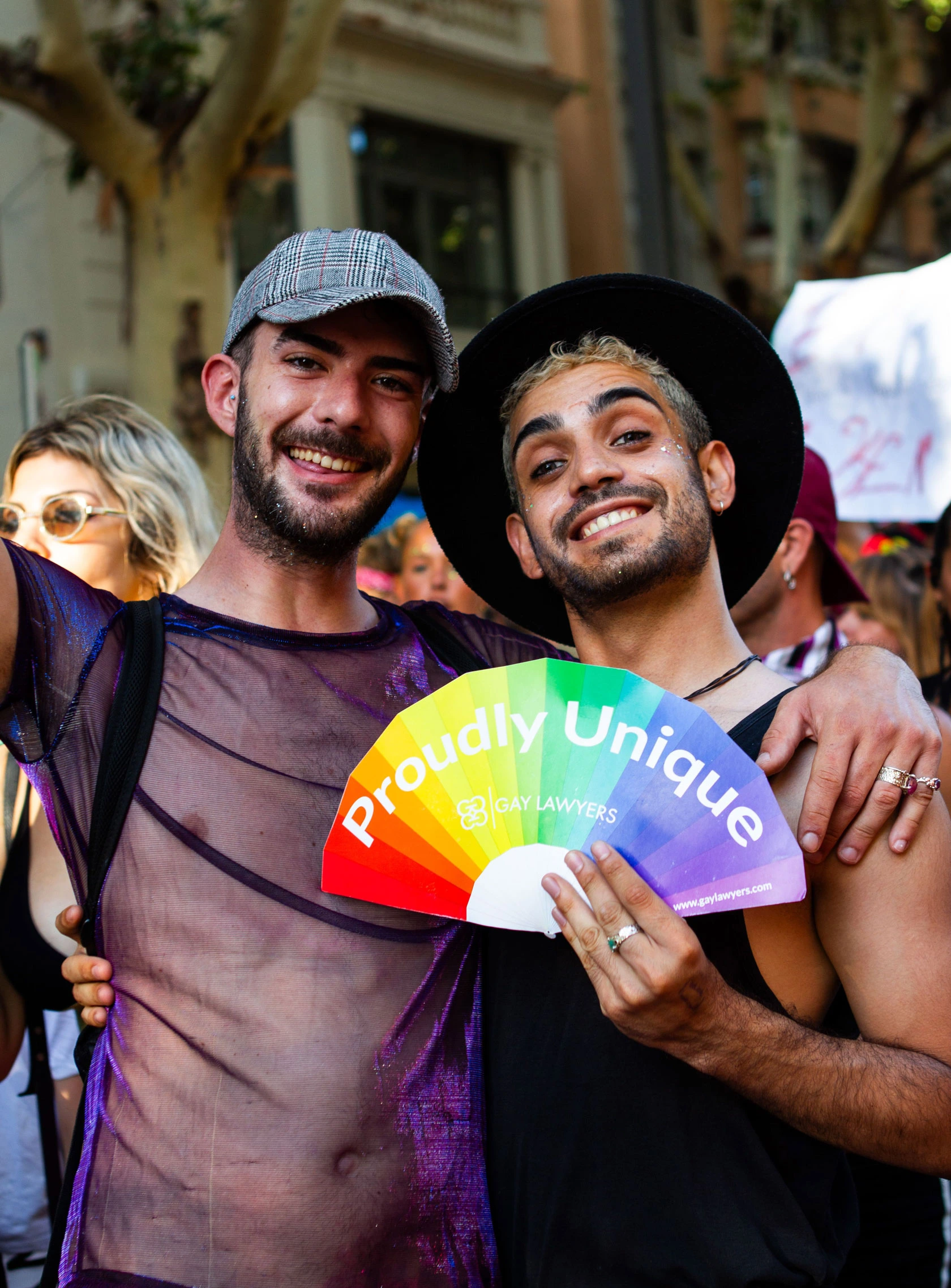 Gay men enjoying an LGBTQ+ event in Sitges