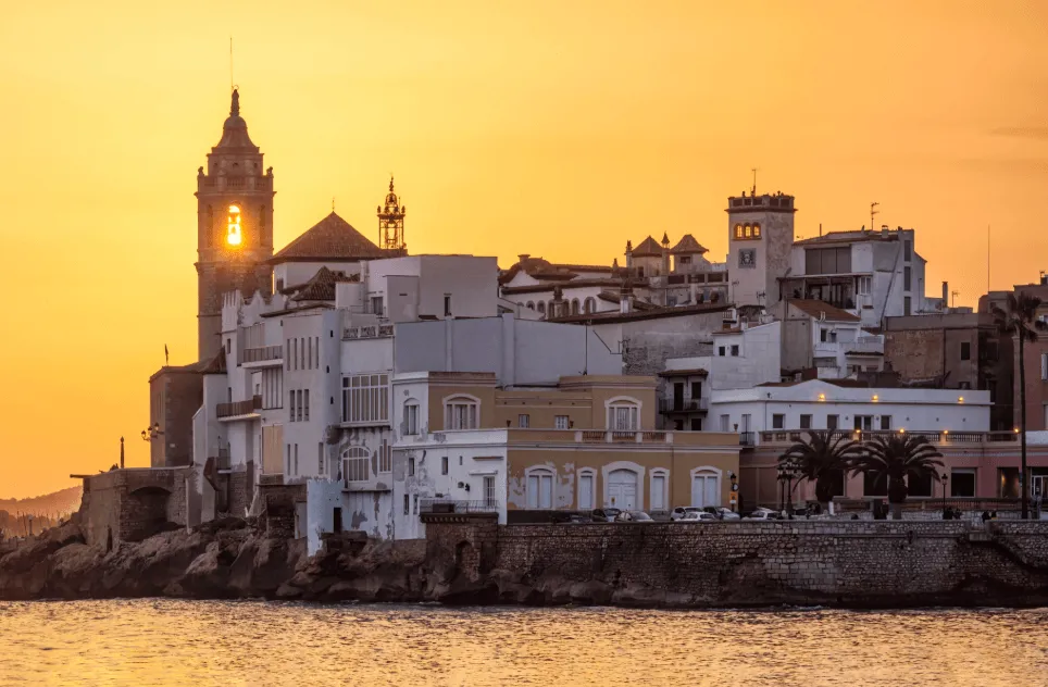 Gay travellers exploring the old town of Sitges - Gay guide to sitges