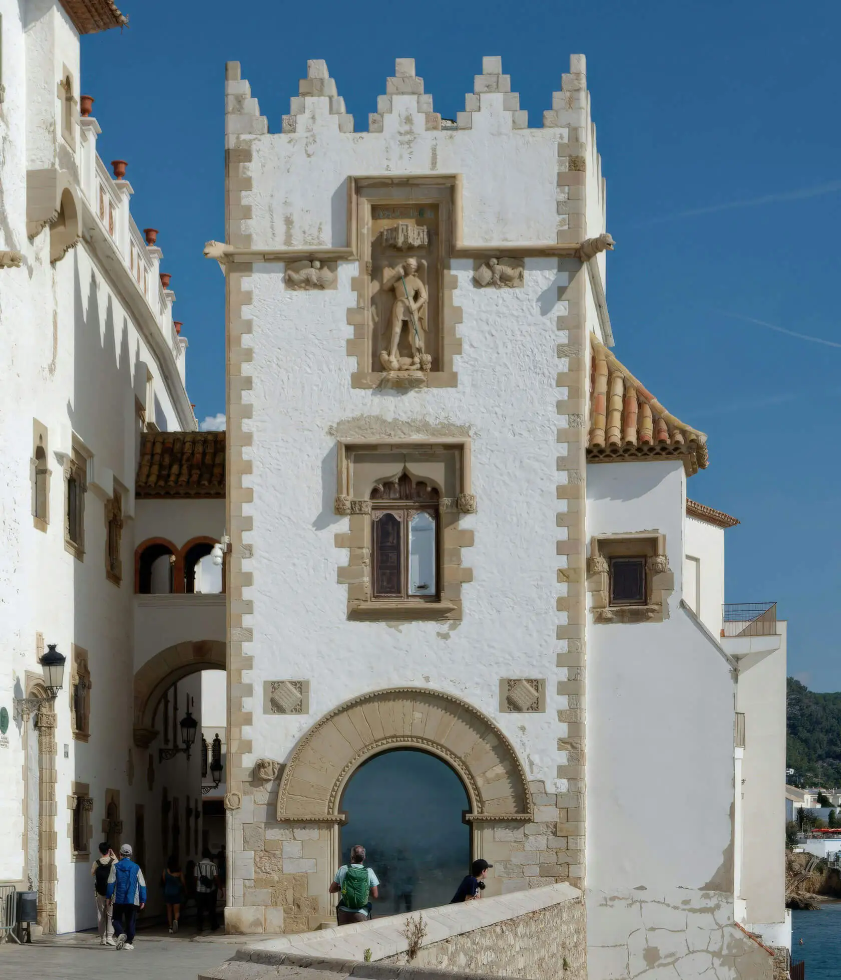 Gay travellers exploring the old town of Sitges