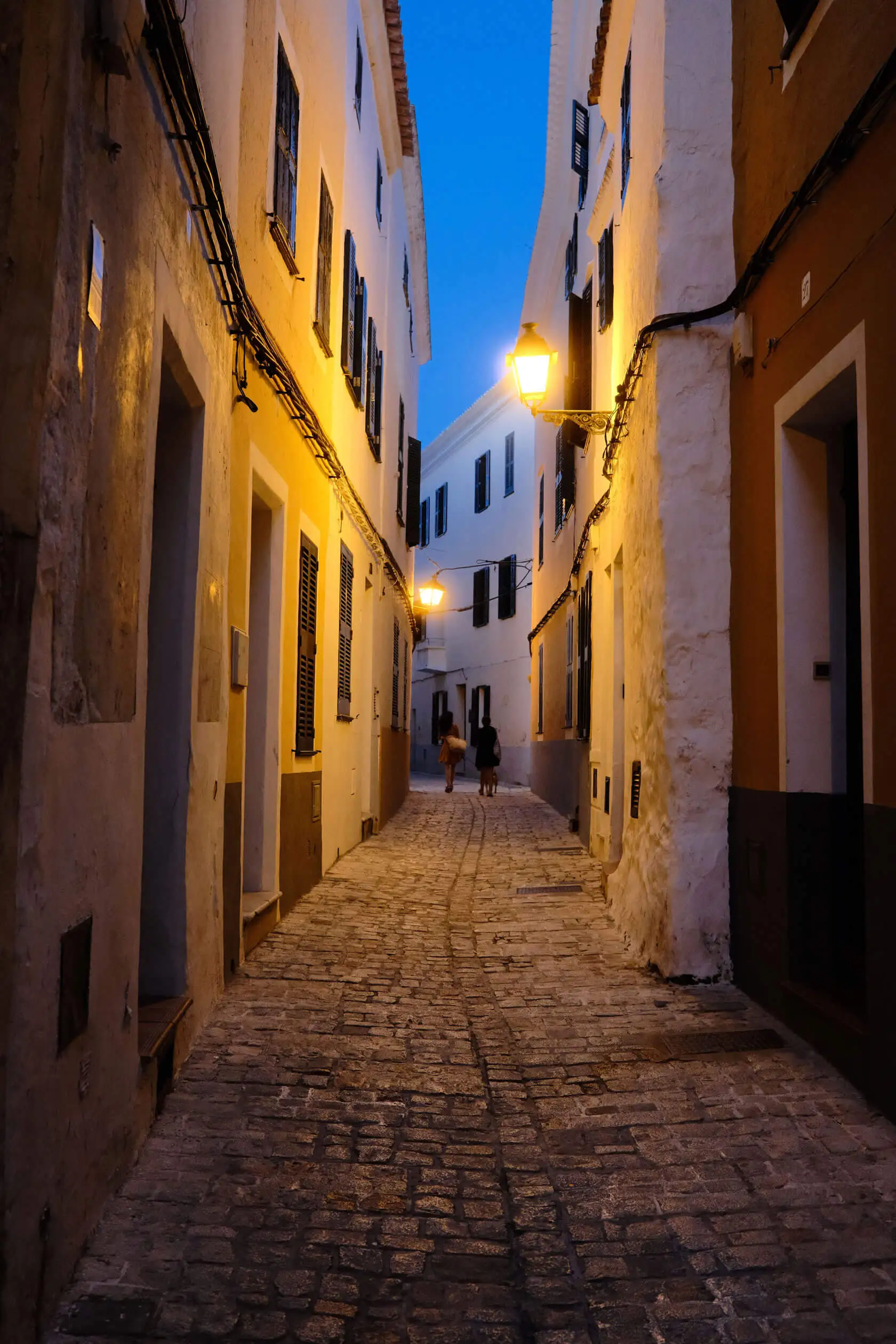 Gay travellers enjoying the evening atmosphere in Sitges old town