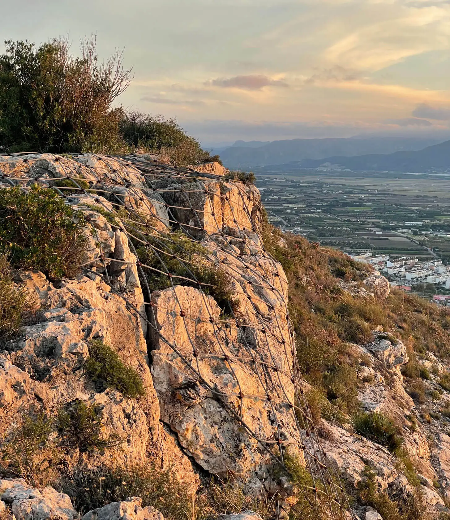 Gay men hiking on a trail in the Garraf landscape near Sitges.