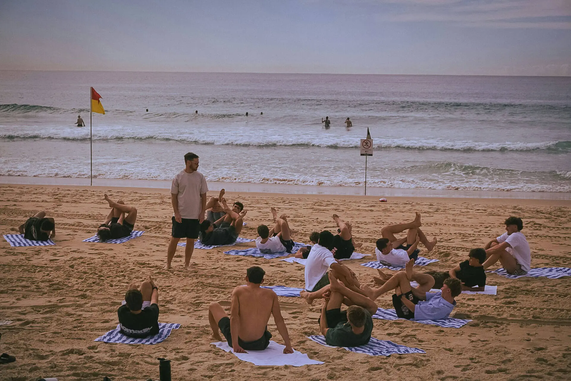 Adult men enjoying a relaxed yoga and wellbeing session at a retreat in Spain